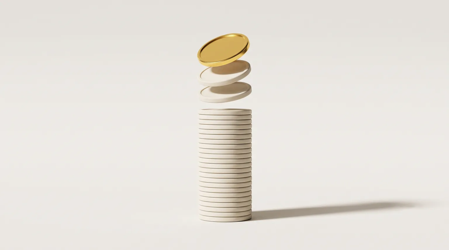 A tall stack of matte discs on an off-white surface, the top few lifted away.