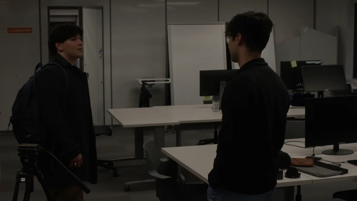 Arie and Luke from the Lodavo team talking at the office